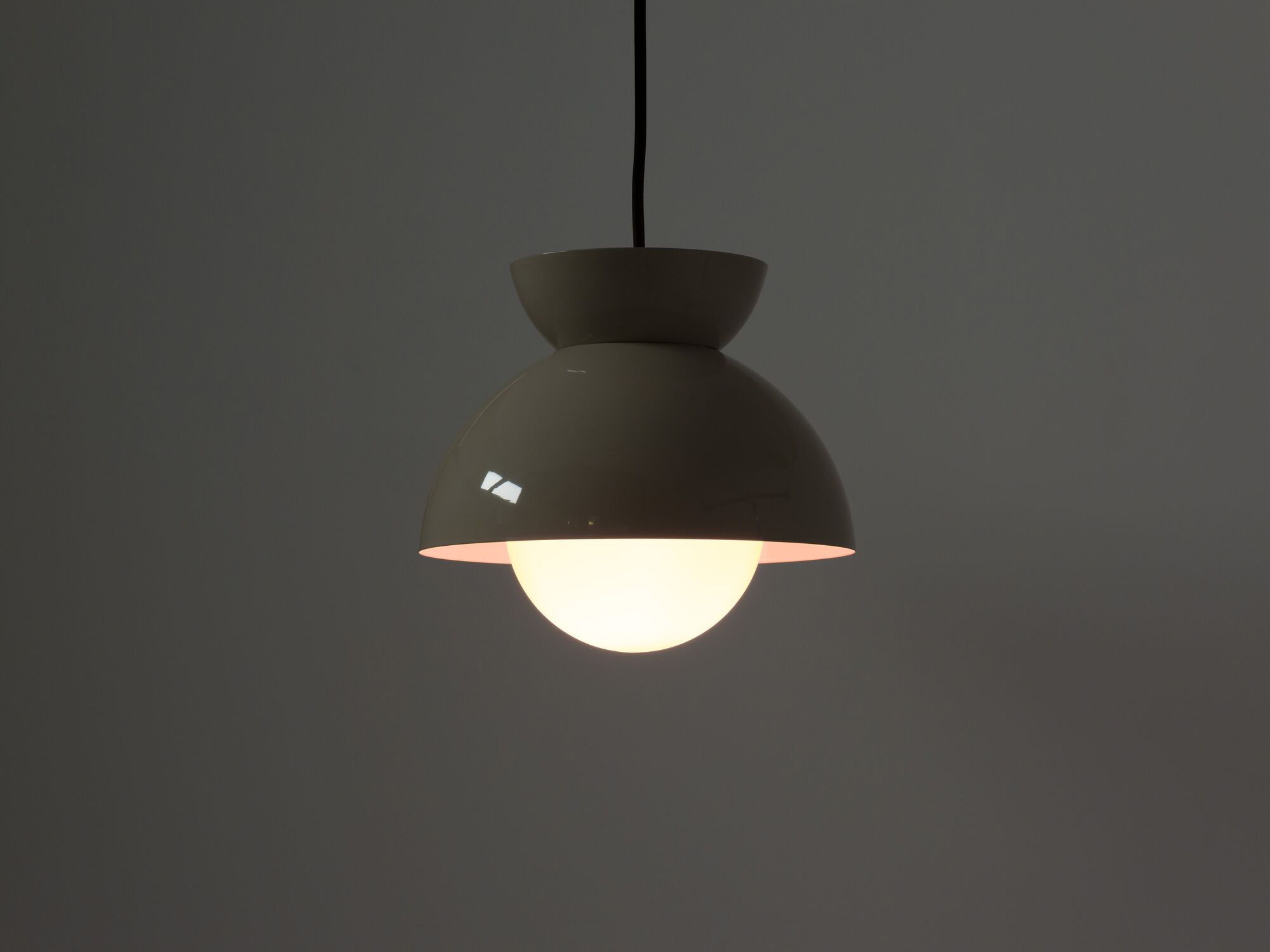 Detail view of modern grey pendant lamp with cool light